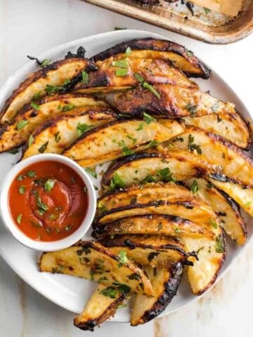 Crispy potato chips in a recipe roundup for potato side dishes.
